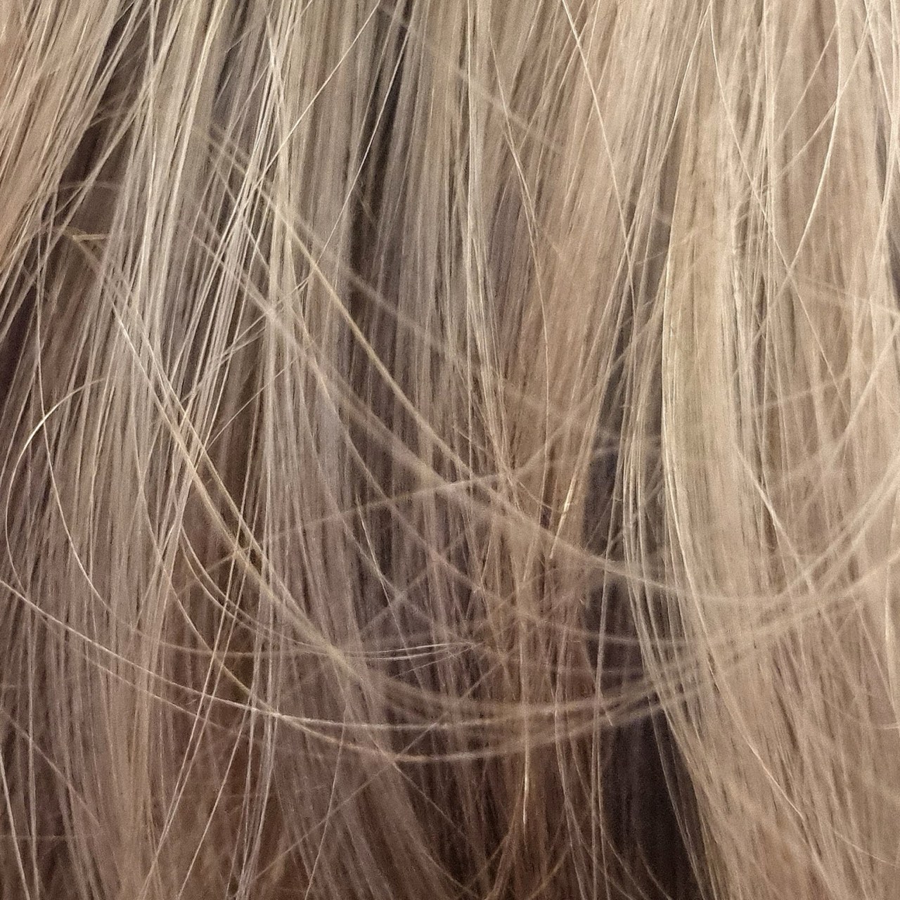 Close-up of light brown balayage hair.